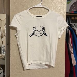 Forever 21 baby tee, slight stain on front by design